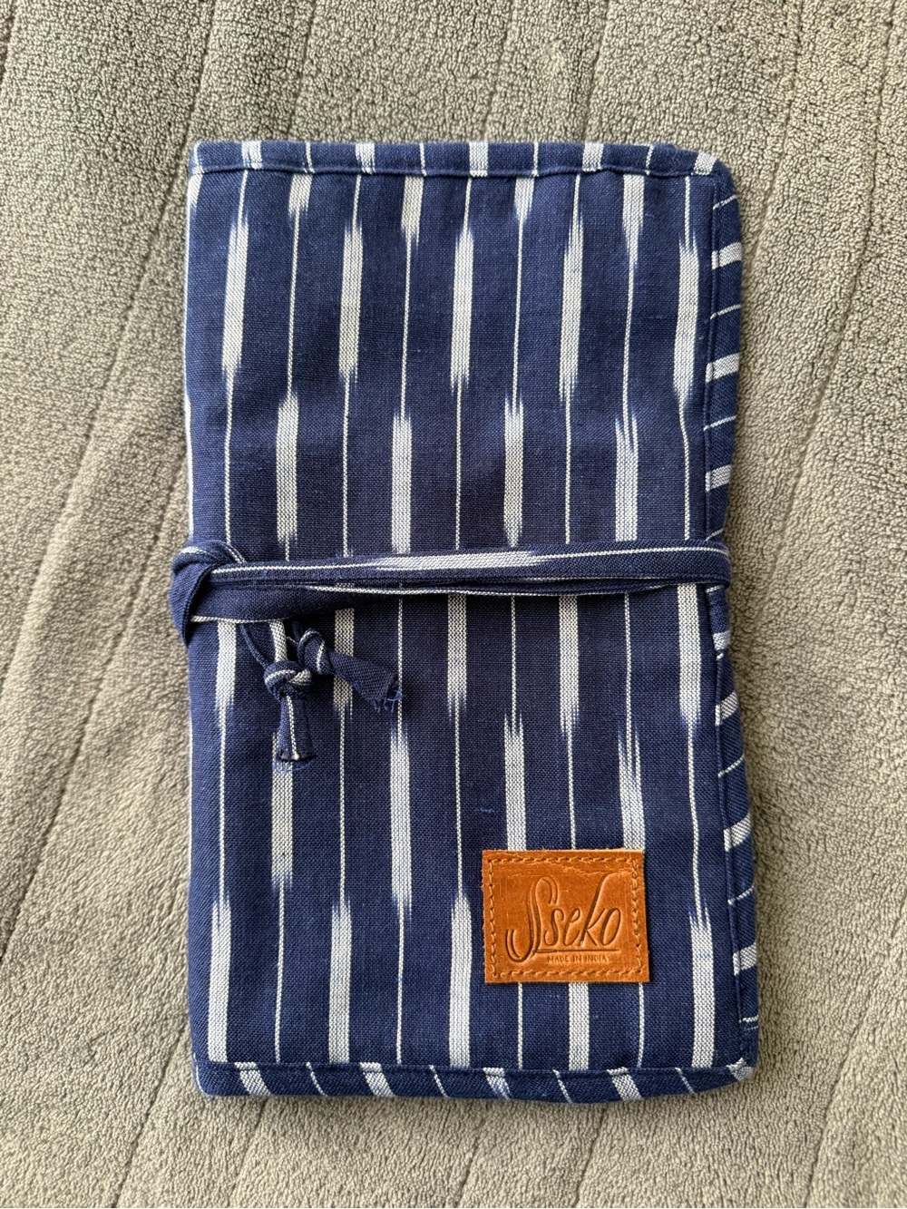 Sseko Navy and White Striped Roll-Up Organizer with Leather Patch